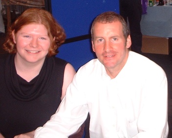 Photograph of Tanya with Chris Barrie. You don't want to know where her hands are.
